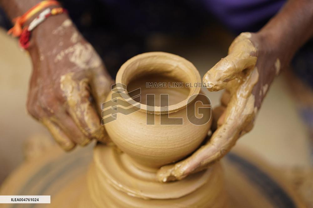 Indian Potter Gives Final Touches to Karva Pot - Ajmer