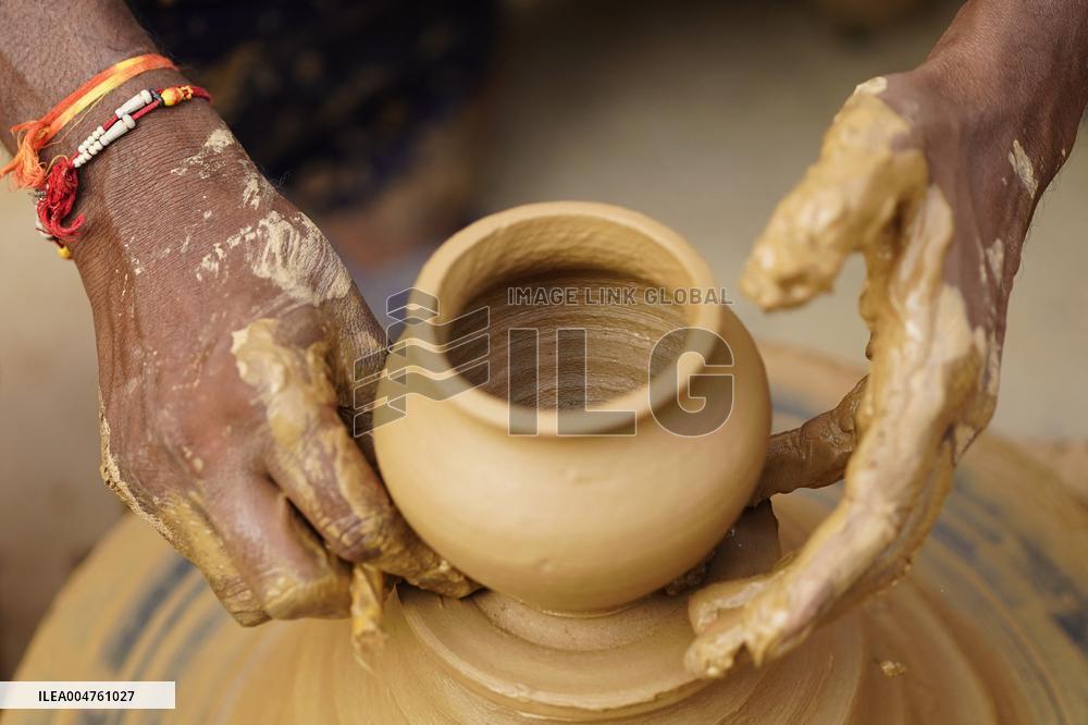 Indian Potter Gives Final Touches to Karva Pot - Ajmer