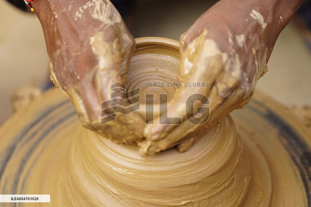 Indian Potter Gives Final Touches to Karva Pot - Ajmer
