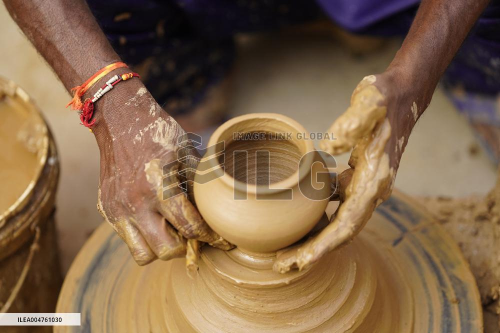 Indian Potter Gives Final Touches to Karva Pot - Ajmer