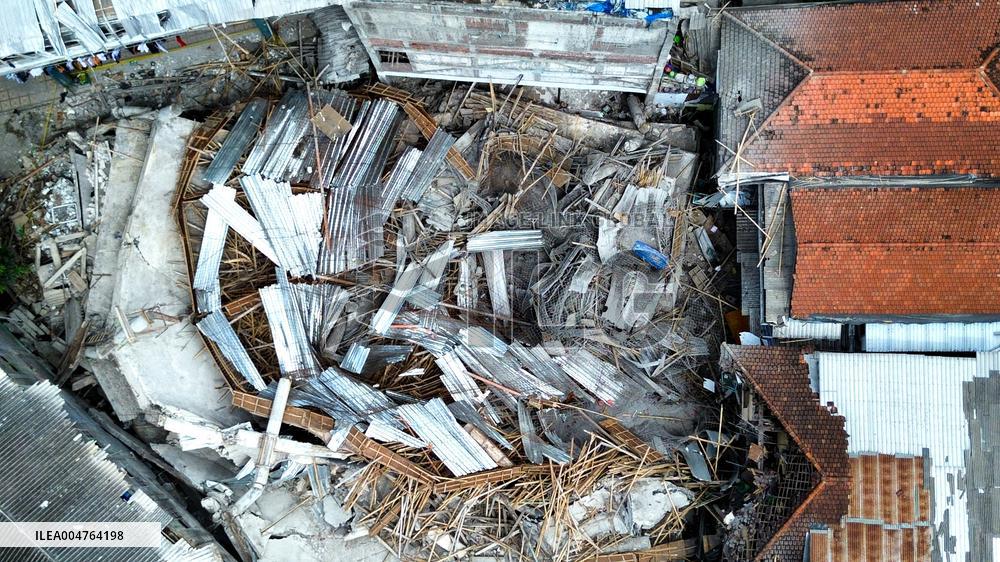 School Collapse Leaves One Student Dead, 38 Missing - Indonesia