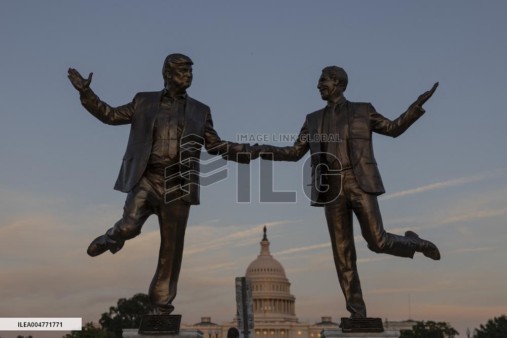 Donald Trump and Jeffrey Epstein Holding Hands Statue Reinstalled - Washington