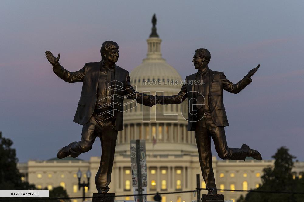 Donald Trump and Jeffrey Epstein Holding Hands Statue Reinstalled - Washington