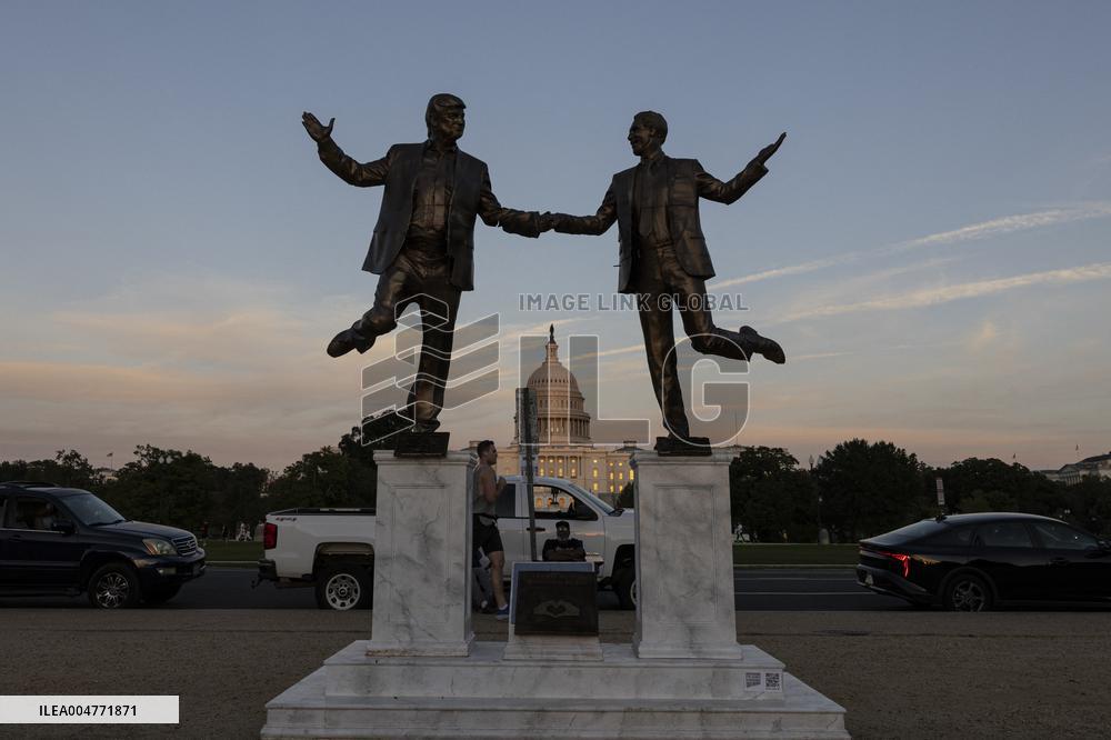 Donald Trump and Jeffrey Epstein Holding Hands Statue Reinstalled - Washington