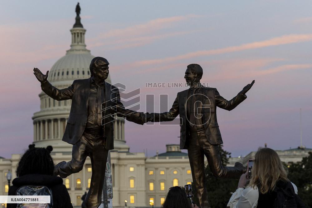 Donald Trump and Jeffrey Epstein Holding Hands Statue Reinstalled - Washington