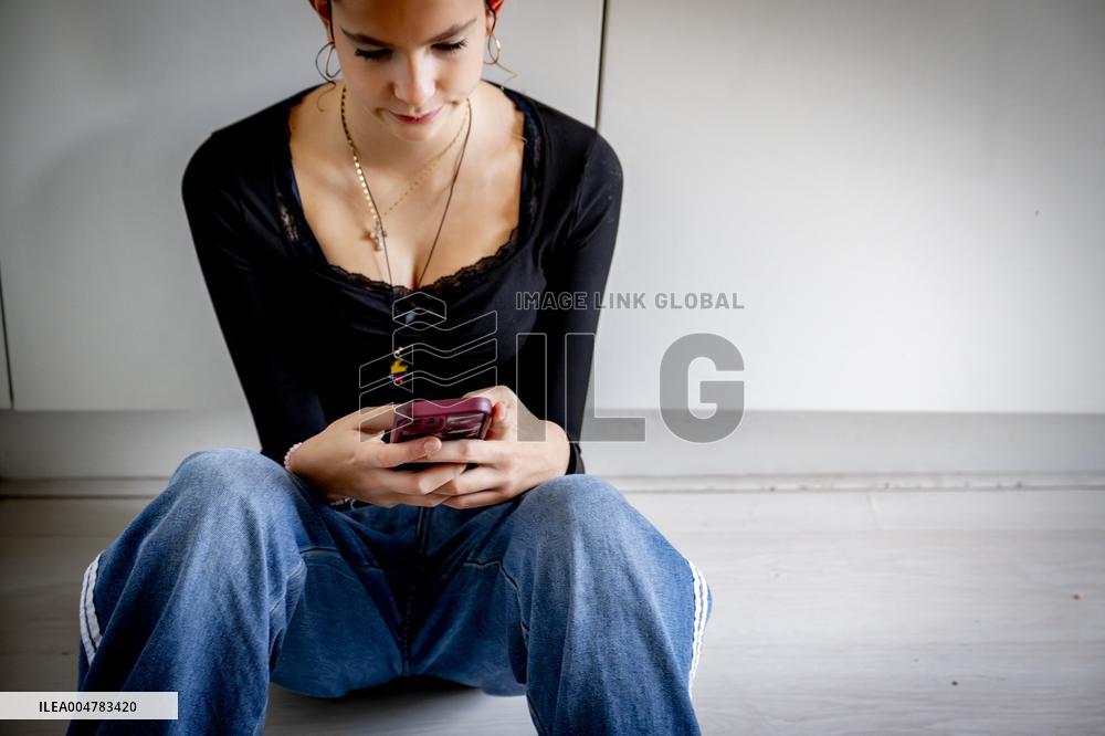 Illustration - A Teenage Girl On Her Cell Phone