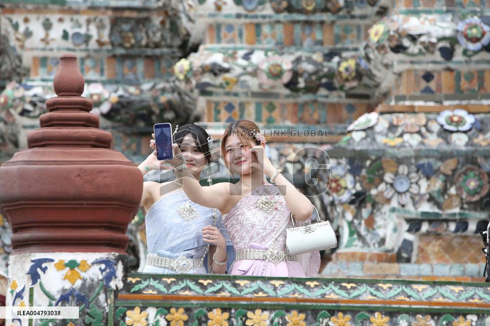 Tourists in Thai Traditional Costumes - Bangkok