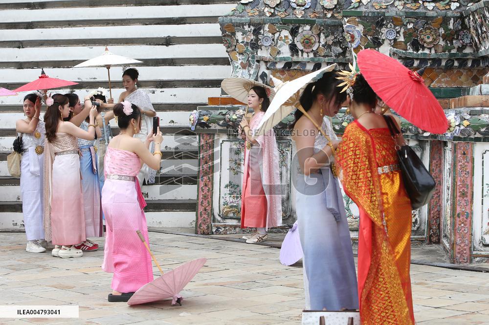 Tourists in Thai Traditional Costumes - Bangkok
