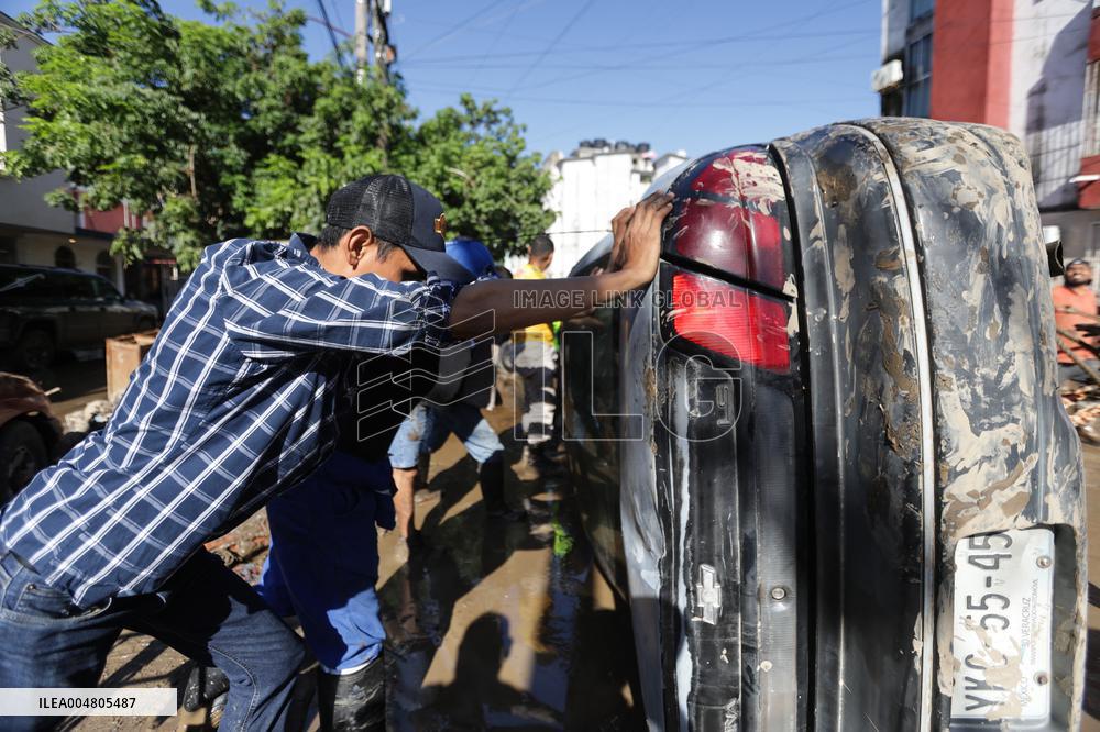 Mexico Floods Leave at Least 64 Dead and 65 Missing