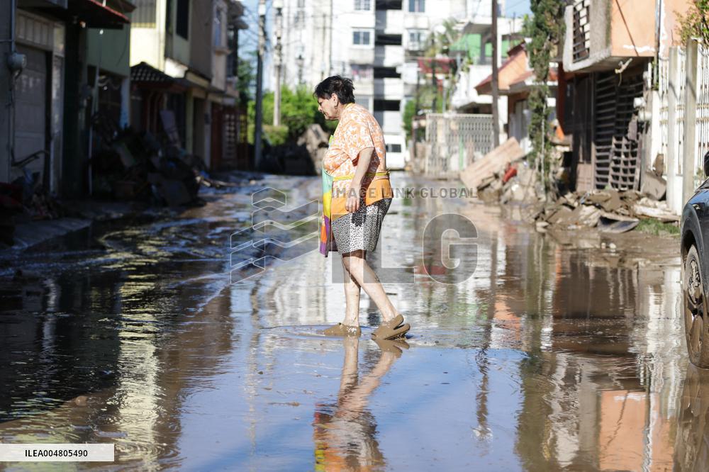 Mexico Floods Leave at Least 64 Dead and 65 Missing
