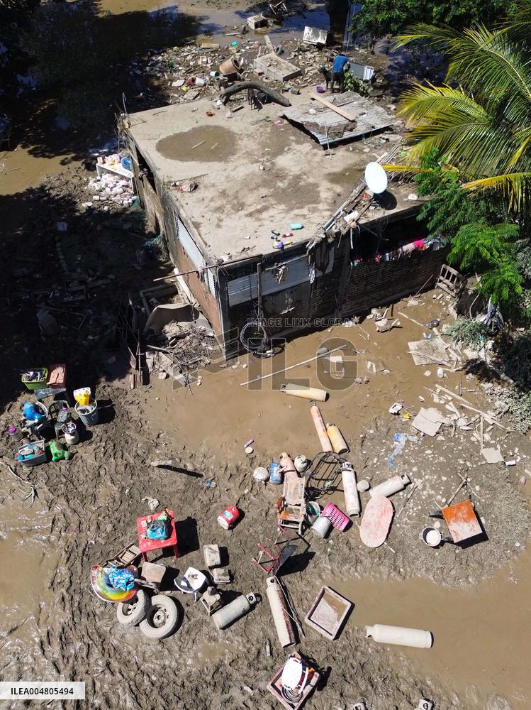 Mexico Floods Leave at Least 64 Dead and 65 Missing
