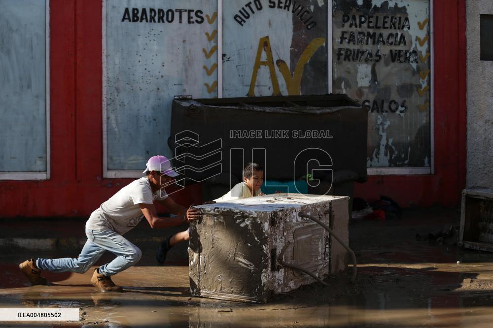 Mexico Floods Leave at Least 64 Dead and 65 Missing