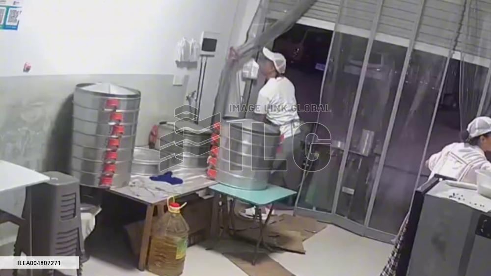 China: Woman Saves Husband From Electrocution Using Bucket of Oil