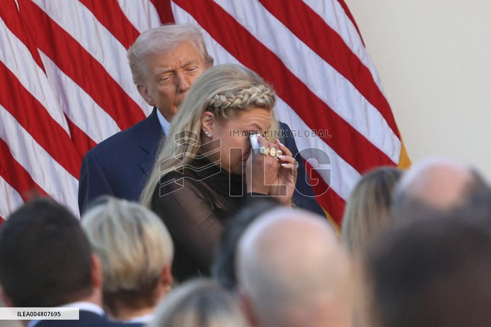 Donald J Trump presents Erika Kirk with the Presidential Medal of Freedom for her late husband Charlie Kirk