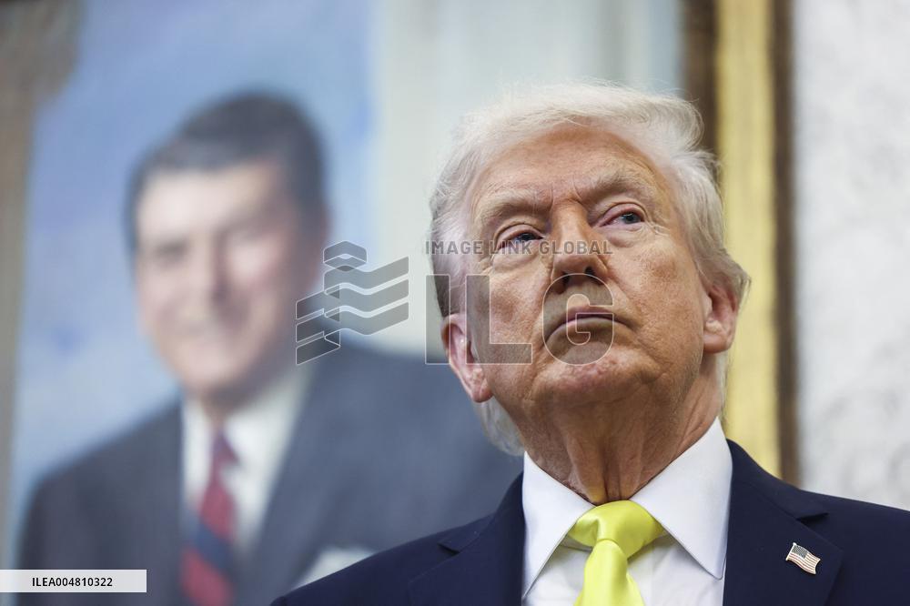 US President Donald Trump and FBI Director Kash Patel speak in the Oval Office