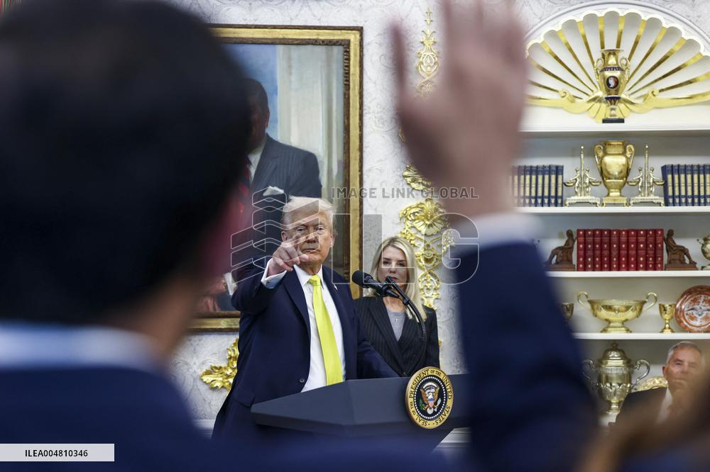 US President Donald Trump and FBI Director Kash Patel speak in the Oval Office