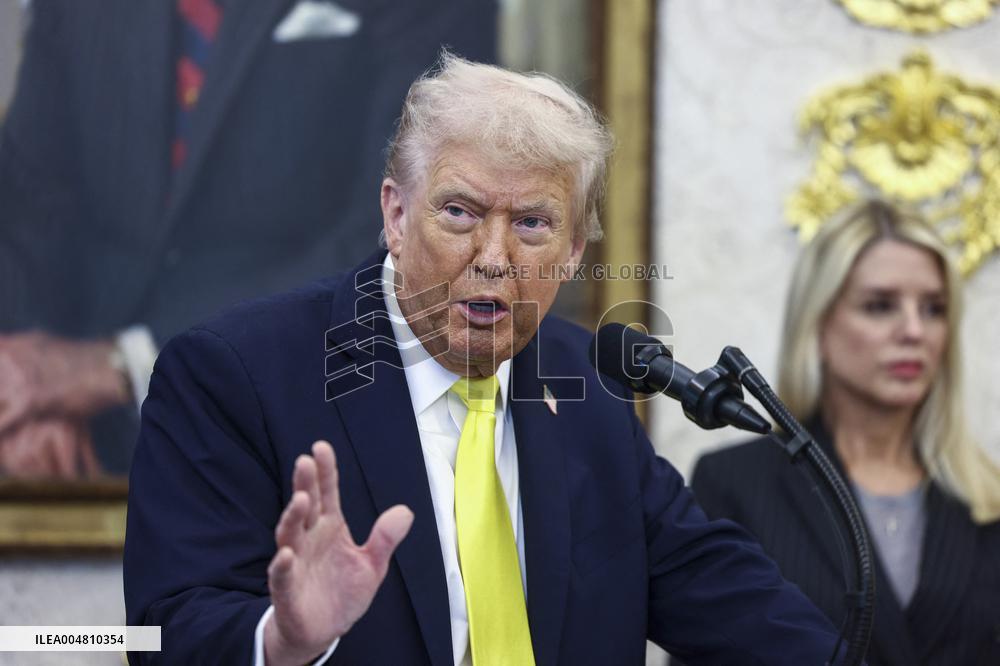 US President Donald Trump and FBI Director Kash Patel speak in the Oval Office