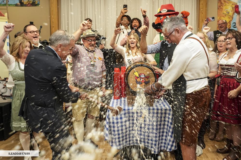 Prime Minister Taps Keg At Oktoberfest - Canada