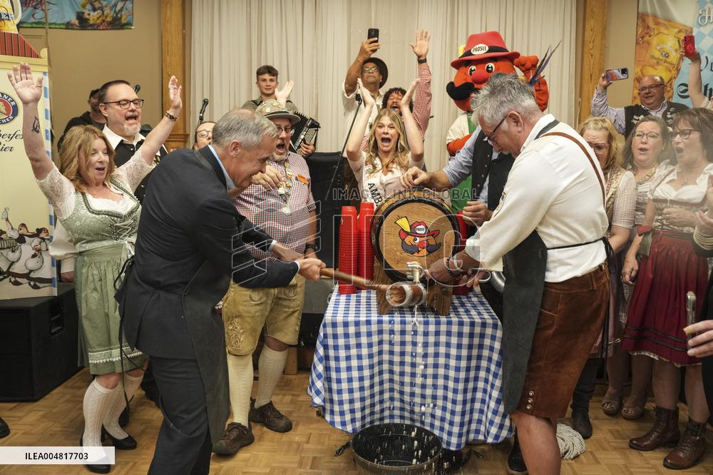 Prime Minister Taps Keg At Oktoberfest - Canada