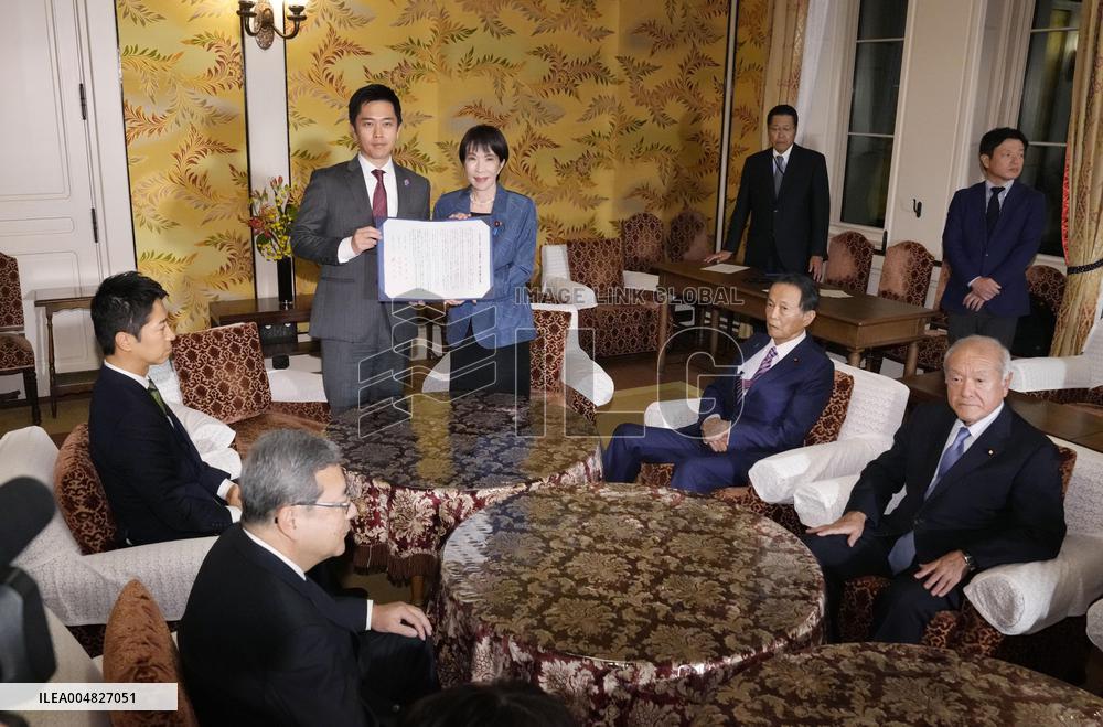 Ruling LDP, JIP sign coalition deal