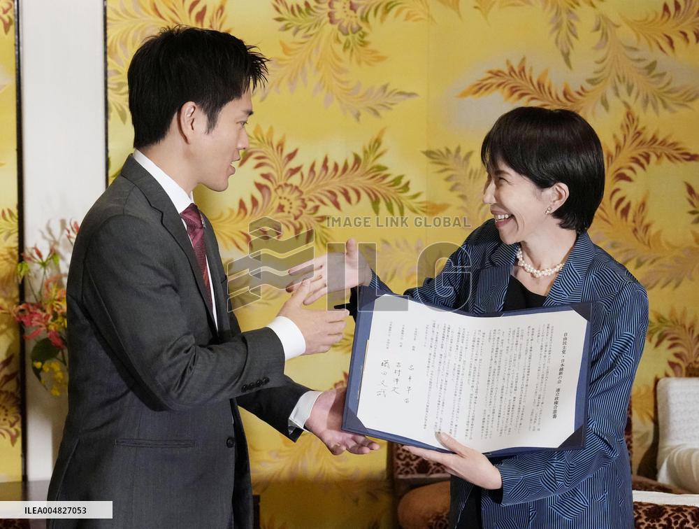 Ruling LDP, JIP sign coalition deal