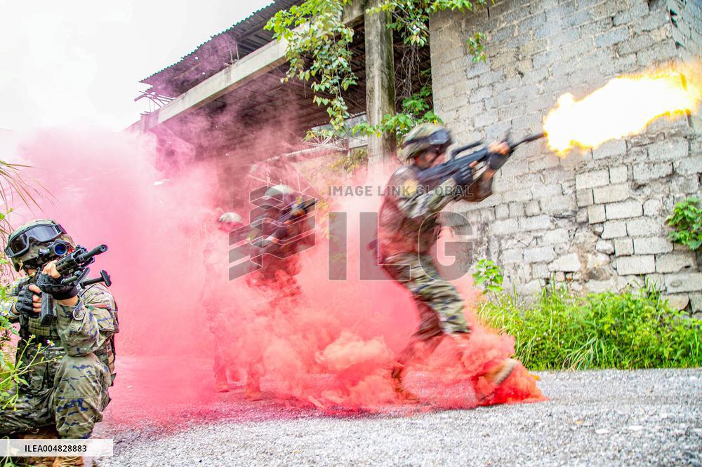 Armed Police Officers And Soldiers  Conduct Drills