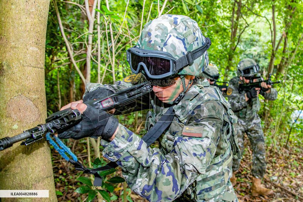 Armed Police Officers And Soldiers  Conduct Drills