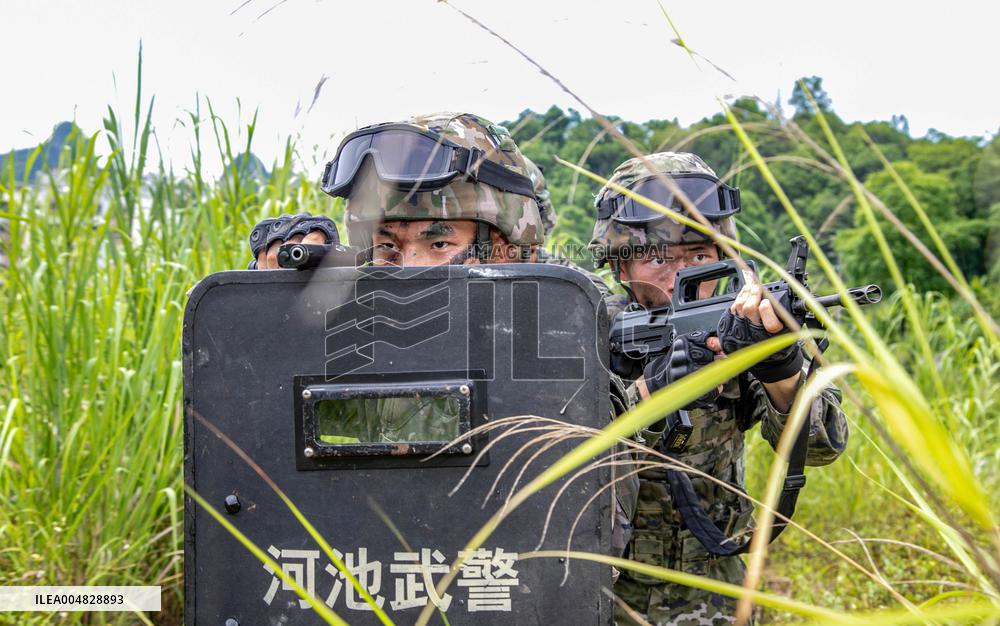 Armed Police Officers And Soldiers  Conduct Drills