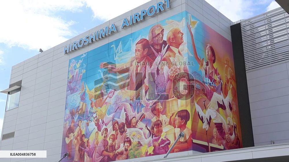 Peace mural on Hiroshima airport exterior wall