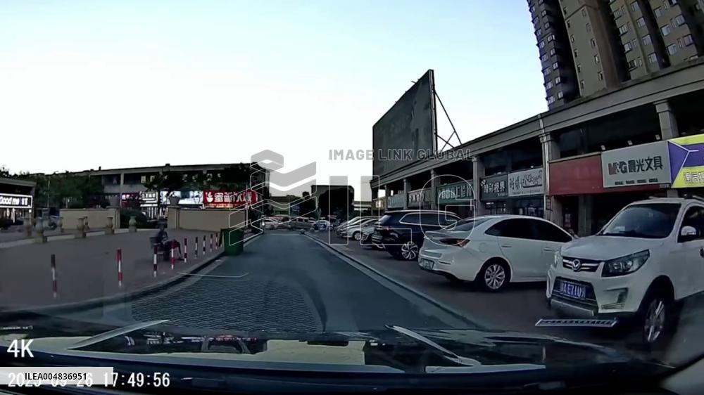 China: Dashcam Captures Boy Struck by Slowly Moving Car in Jiangxi