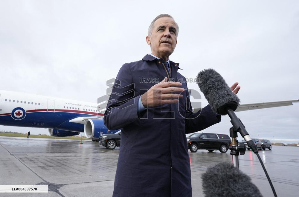 Mark Carney Speaks To Press Before Boarding Plane - Ottawa
