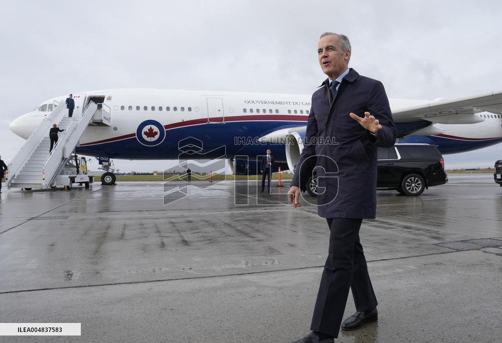 Mark Carney Speaks To Press Before Boarding Plane - Ottawa