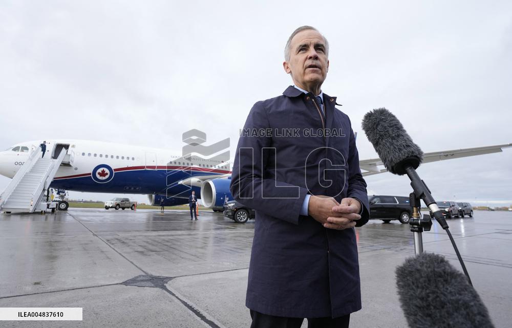 Mark Carney Speaks To Press Before Boarding Plane - Ottawa