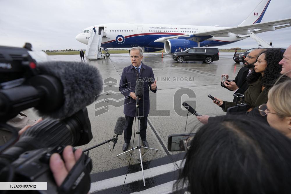 Mark Carney Speaks To Press Before Boarding Plane - Ottawa