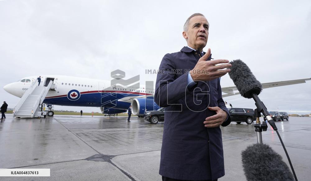 Mark Carney Speaks To Press Before Boarding Plane - Ottawa