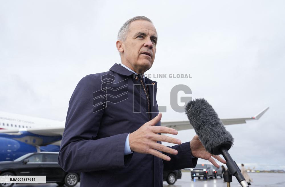 Mark Carney Speaks To Press Before Boarding Plane - Ottawa