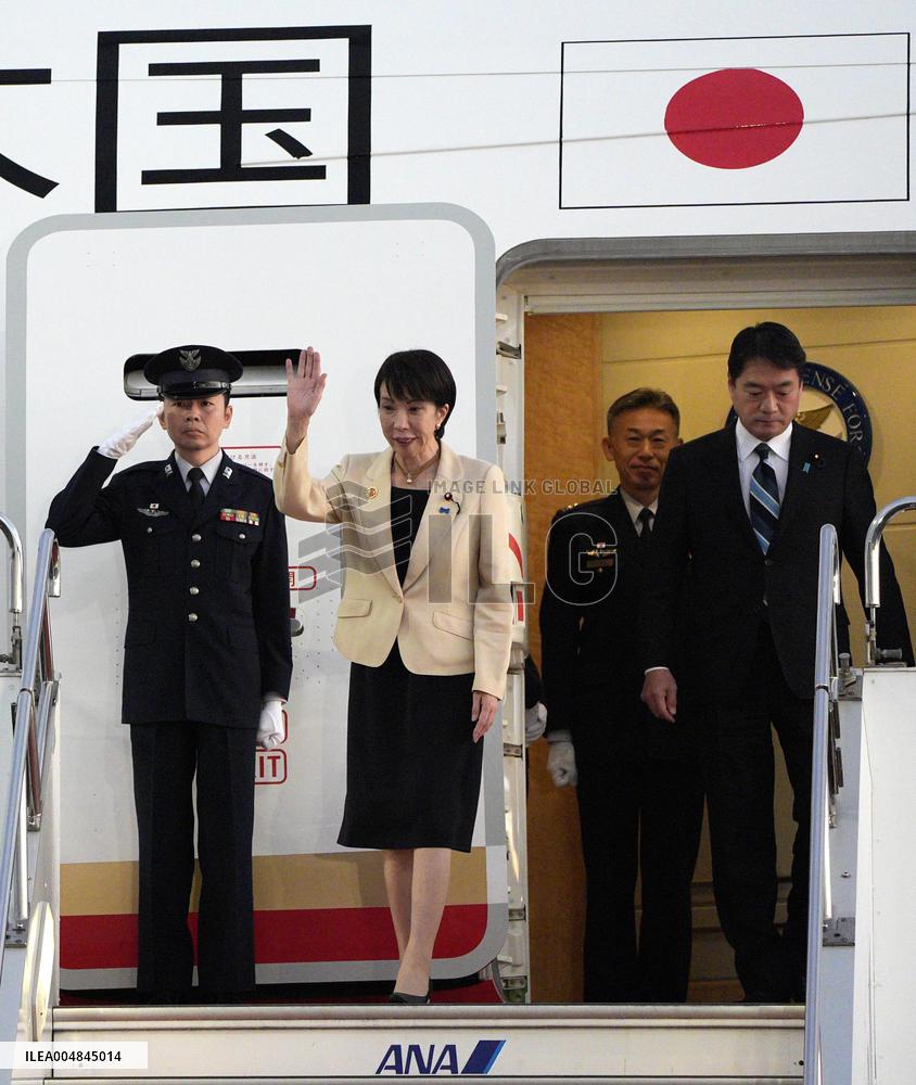 Japan PM Takaichi returns home