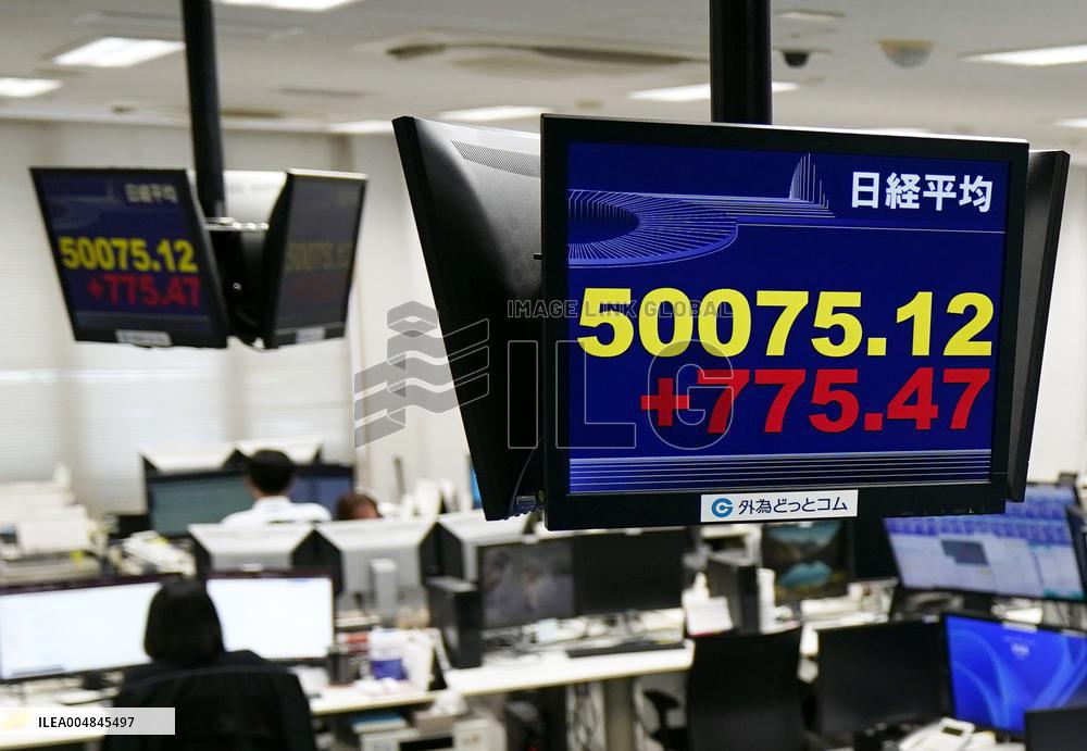 Nikkei stock index tops 50,000 for 1st time