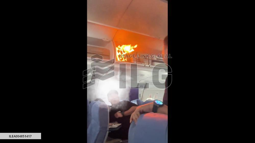China: Luggage Catches Fire on Airplane, Cabin Crew Puts Out Blaze