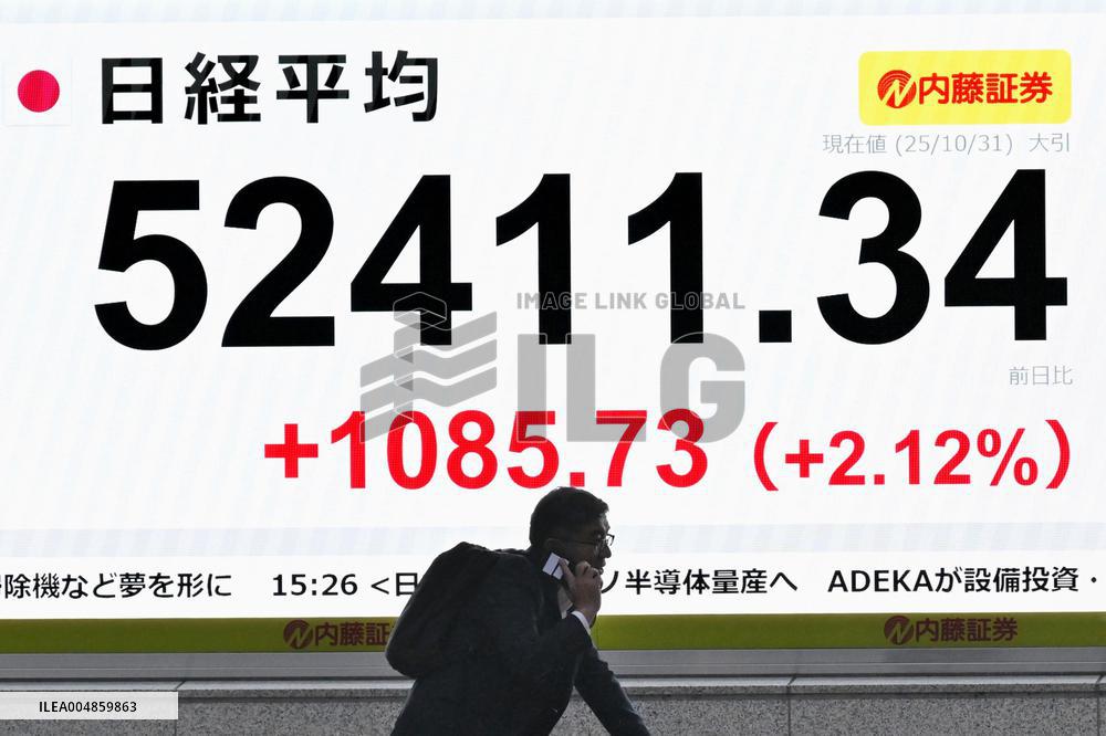 Nikkei index ends at record high