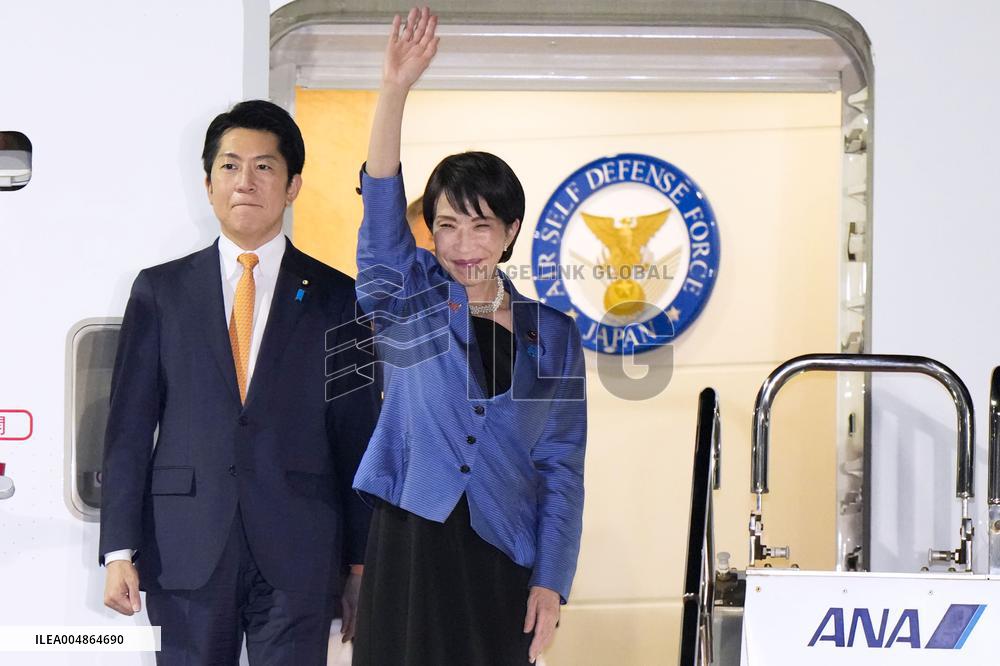 Japan PM Takaichi returns home