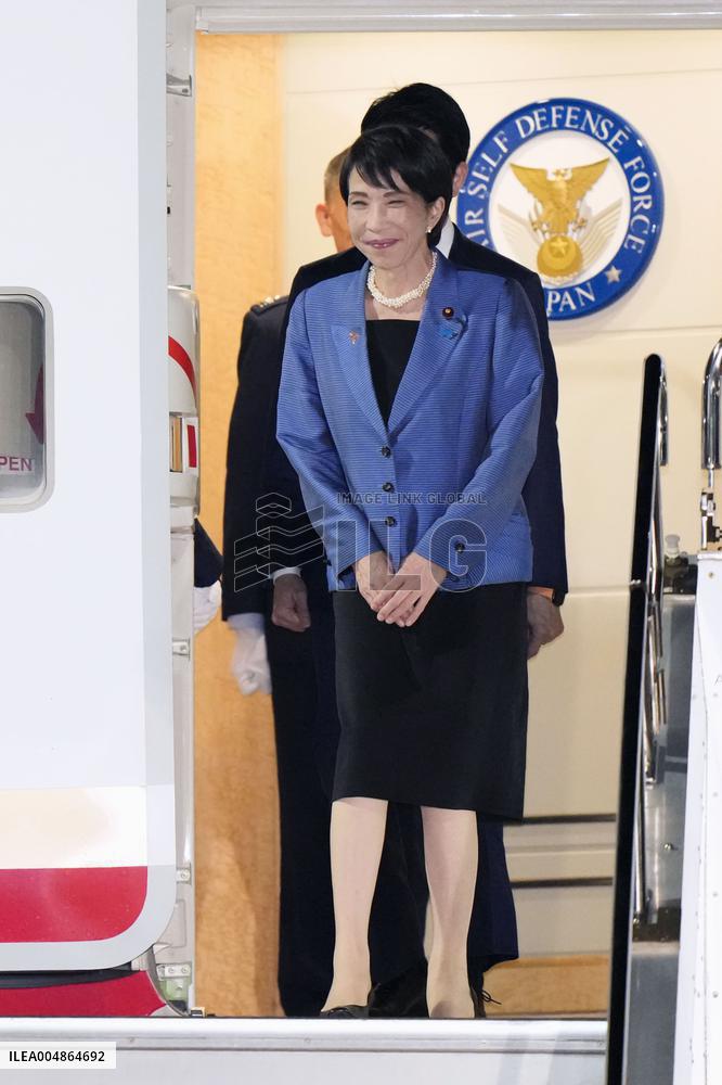 Japan PM Takaichi returns home