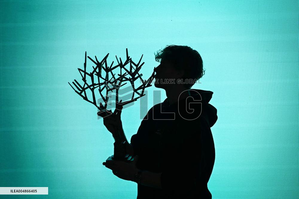 Jannik Sinner poses with Rolex Paris Masters 2025 trophy in Paris FA