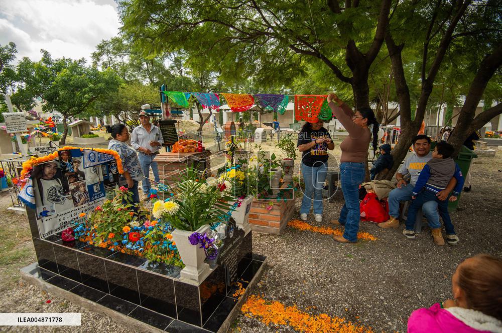 People Visit Cemeteries on the Day of the Dead - Mexico
