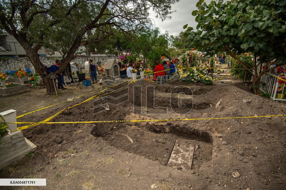 People Visit Cemeteries on the Day of the Dead - Mexico