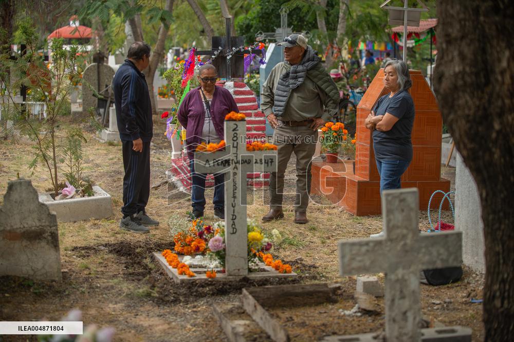 People Visit Cemeteries on the Day of the Dead - Mexico
