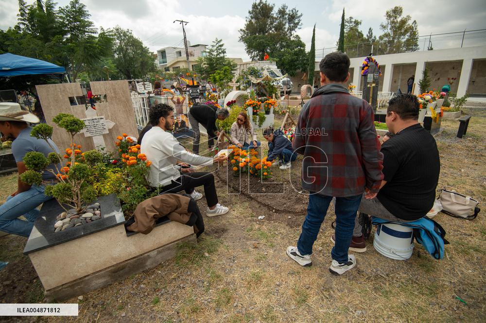 People Visit Cemeteries on the Day of the Dead - Mexico