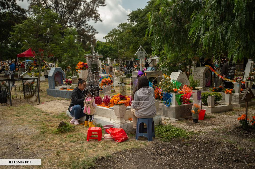 People Visit Cemeteries on the Day of the Dead - Mexico