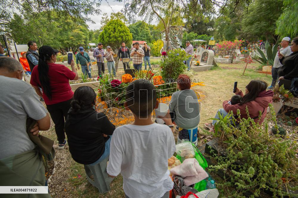 People Visit Cemeteries on the Day of the Dead - Mexico