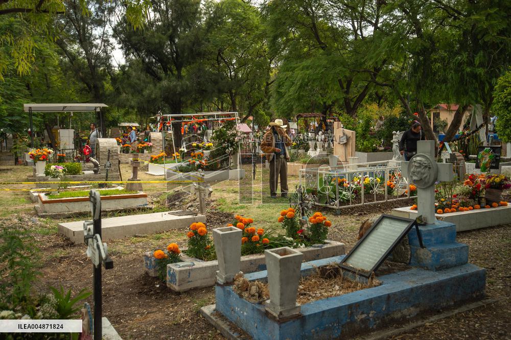 People Visit Cemeteries on the Day of the Dead - Mexico